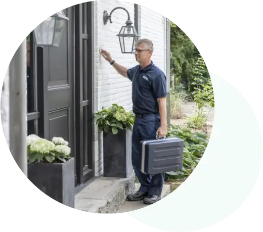 Person knocking on door for a scheduled maintenance or repair appointment